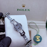 Rolex automatic watch movement silver with green dial